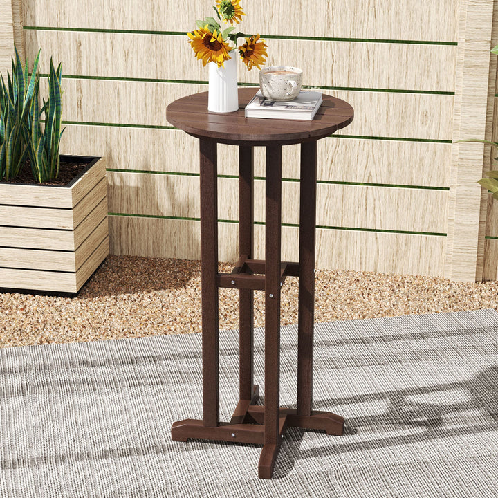Dark brown outdoor bar table with round top and four slatted legs
