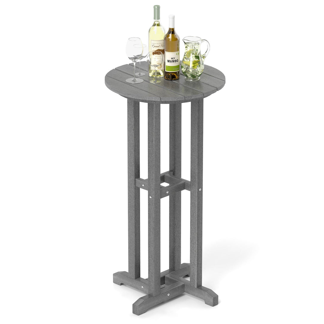 Gray outdoor bar table with round top and bottle-and-glass arrangement