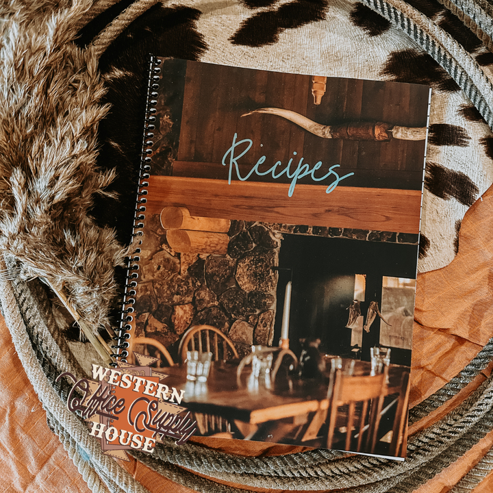 Recipe book with spiral binding, “Recipes” cover featuring Western-style illustration