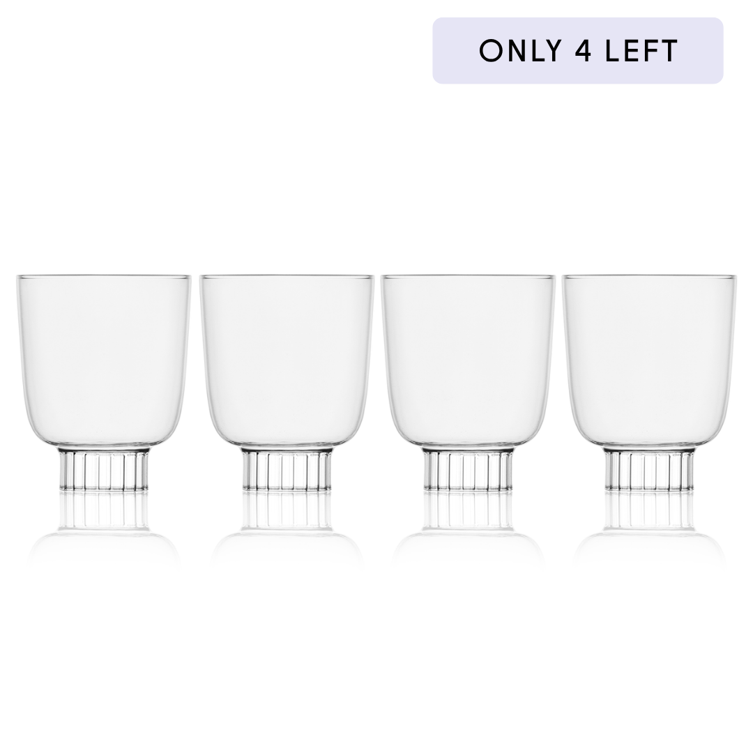 Clear cocktail glasses set of 4, short stemmed tumbler style with fluted base.