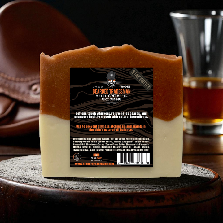 Amber-and-cream bar soap with Whisker Wash label on front
