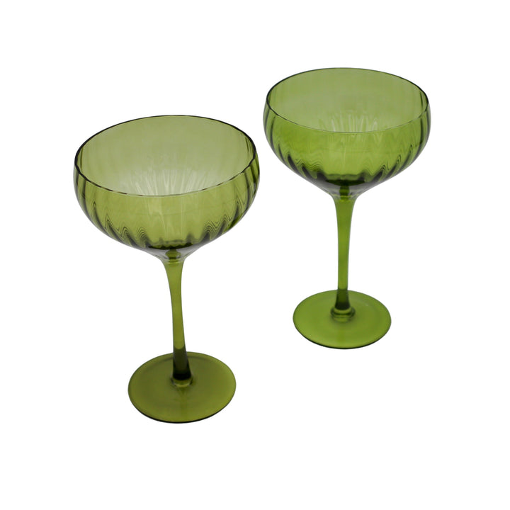 Set of 4 ribbed sage-green coupe glasses with short stem and round bowl.