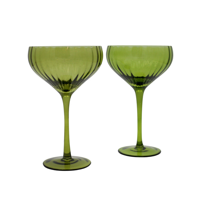 Pair of ribbed sage-green coupe glasses on matching bases, showing bowl and stem.