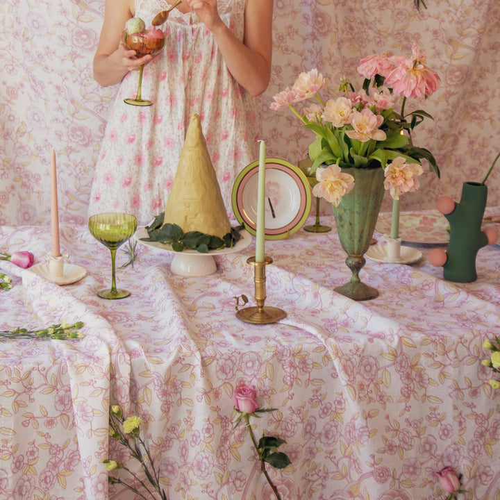 Green ribbed coupe glasses with short stem, several glasses on dressed table