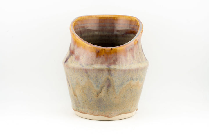 Ceramic dried flower sconce with side opening, tan and blue speckled glaze, cream base