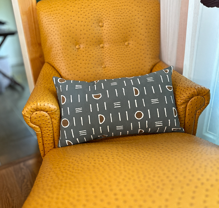 Lumbar pillow cover, dark gray mudcloth with white lines and brown oval motifs