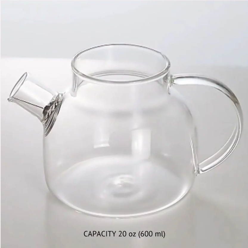 Glass tea steeper pot with spout, curved handle, and open top rim