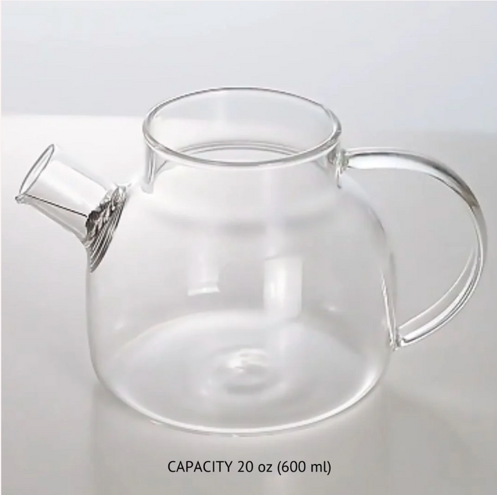 Glass tea steeper pot with spout, curved handle, and open top rim