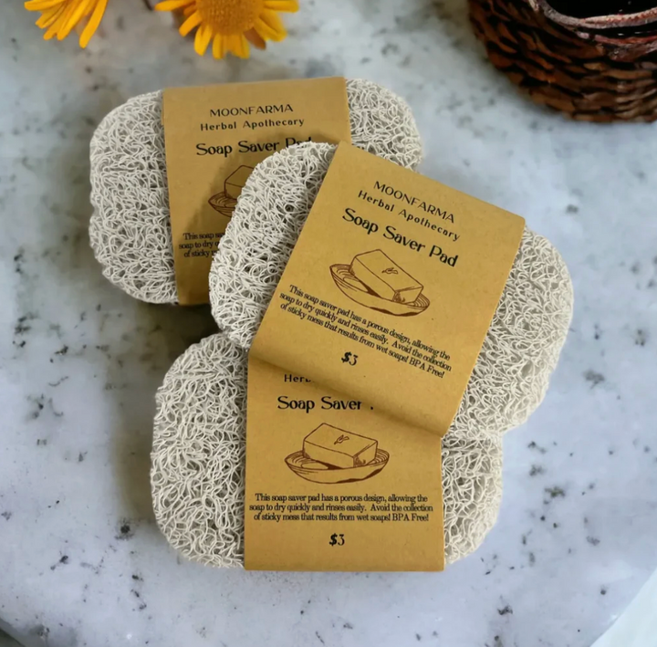 Soap saver pads, round loofah-like scrub pads with tan mesh texture