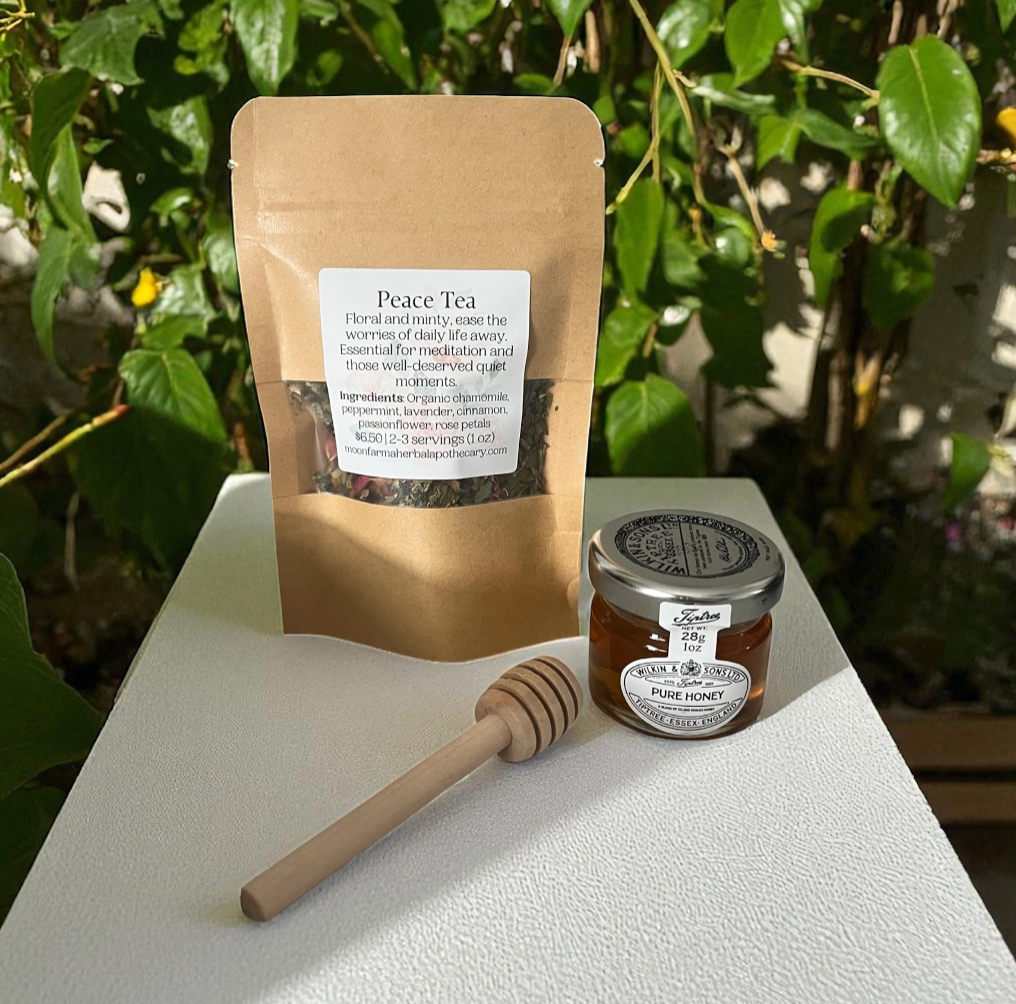 Peace tea and honey set with wooden dipper and honey jar