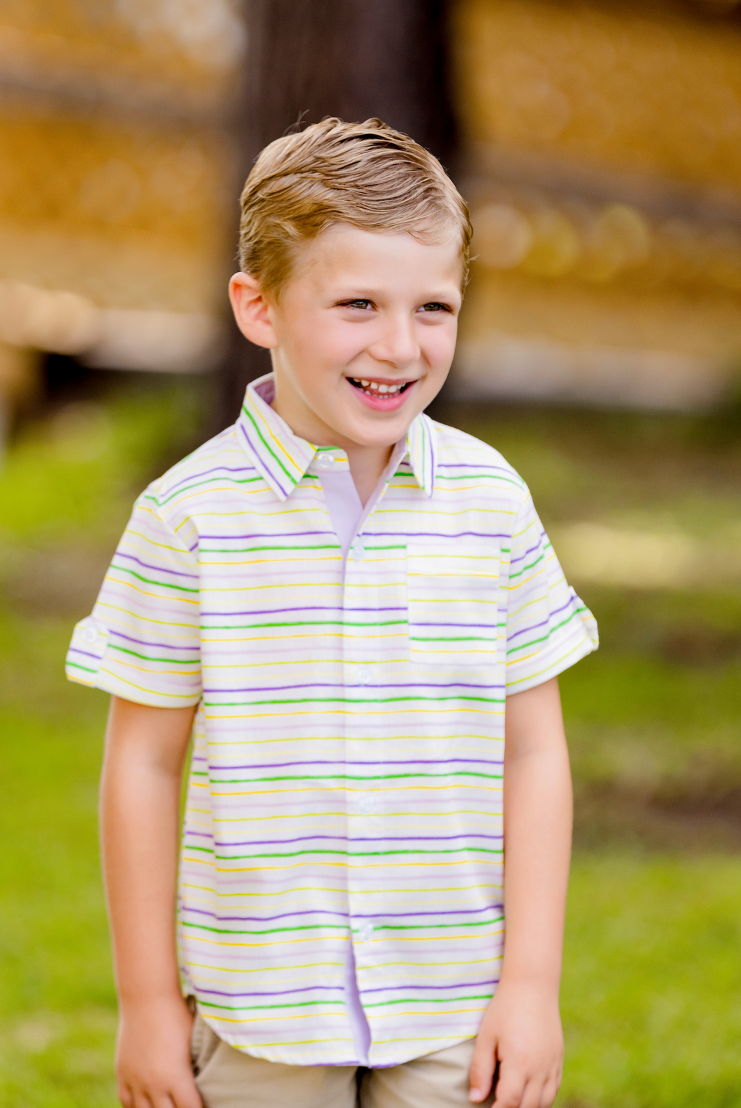 Kids short-sleeve collared shirt with pastel yellow, green, and purple stripes