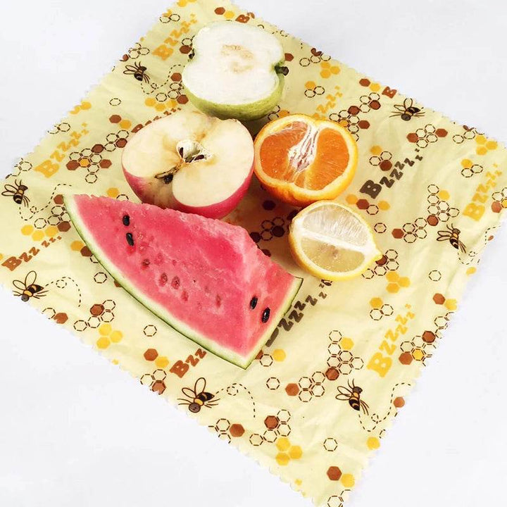 Beeswax food wrap, square white fabric with watermelon, citrus, and apple prints