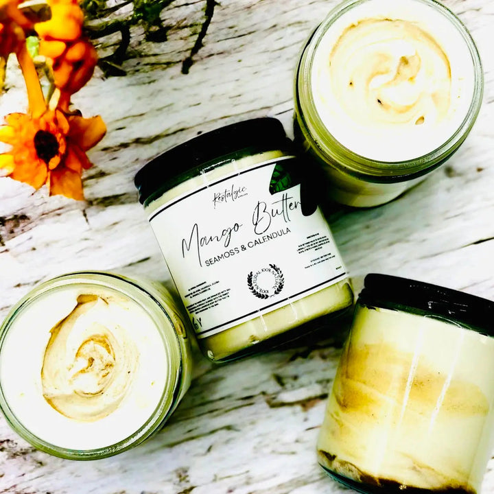 Mango butter jars and open tub with pale yellow cream on display