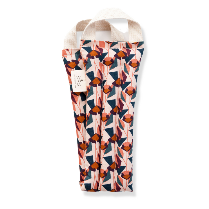 Blush floral neck wrap, abstract leaf and flower pattern, folded fabric
