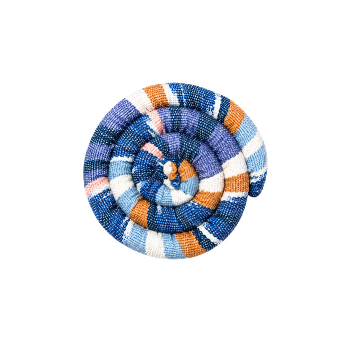 Round spiral trivet with blue, orange, and cream plaid stripes and stitched rosette center