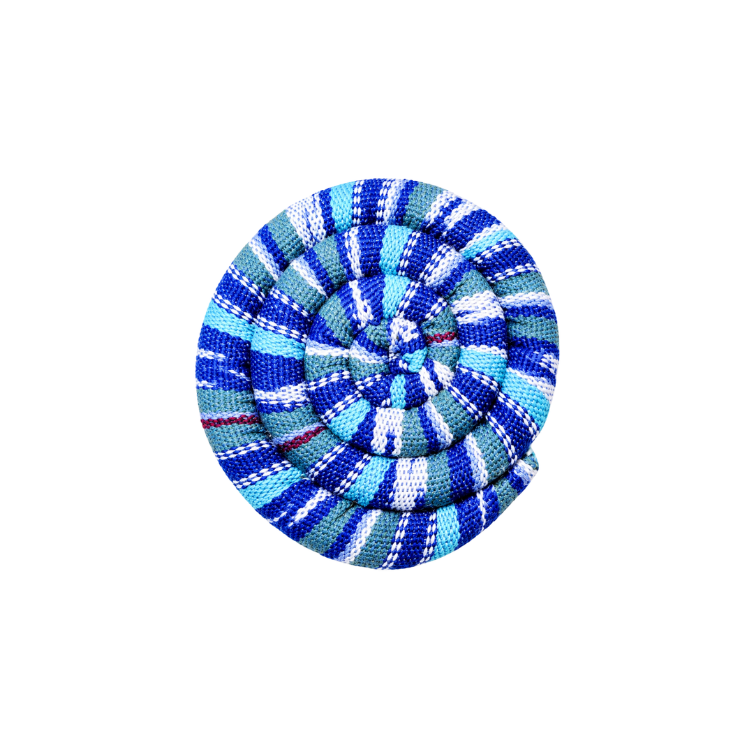 Round spiral trivet with blue and white plaid stripes and stitched rosette center
