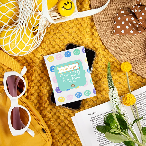 Screen &amp; Lens Wipes pouch pack with smiley icons, shown with accessories.
