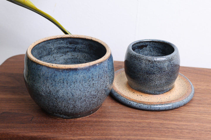 Ceramic butter dish set with dark blue bowls and plate, speckled finish