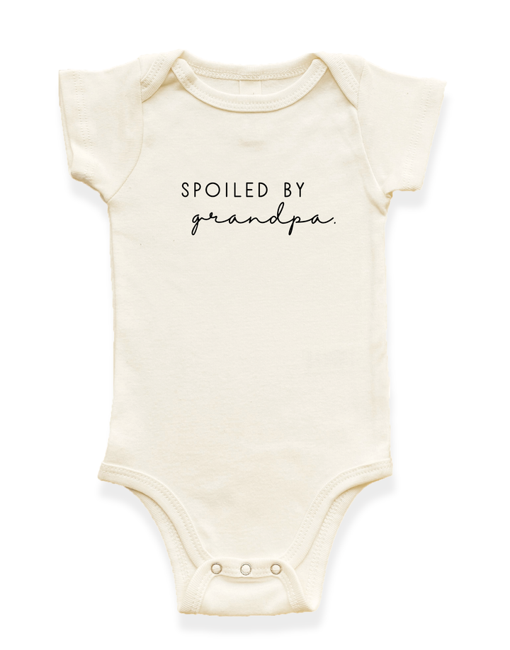 Cream short-sleeve baby bodysuit with front text design and snap button crotch