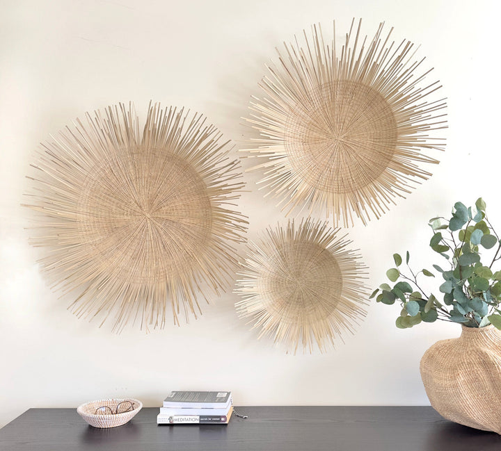 Natural raffia sunburst wall plate trio with three round woven discs