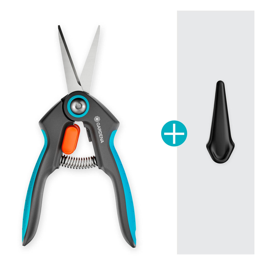 FreshCut Scissors with teal handles and included black blade guard.
