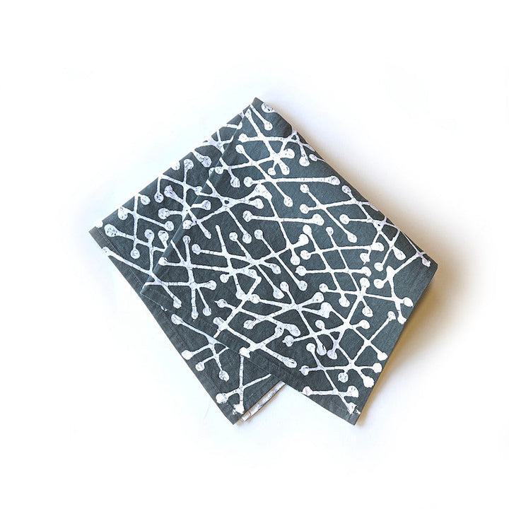 Set of 2 dark gray napkins with white abstract line-and-circle pattern