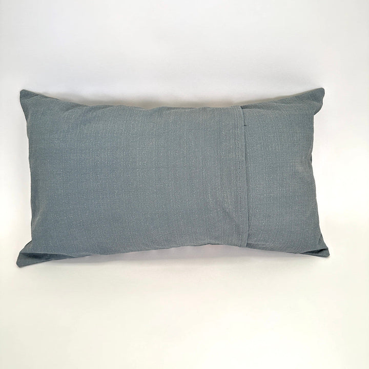 Solid dark gray lumbar pillow cover with centered seam