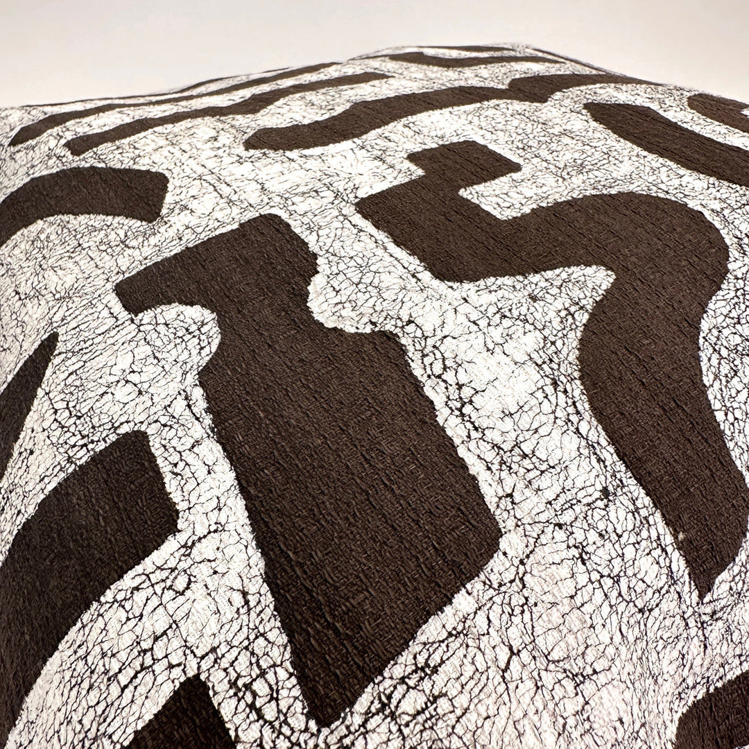 Brown and white abstract mark pattern pillow cover close-up