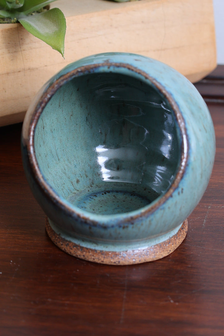 Handmade stoneware salt cellar, glossy teal interior with speckled exterior, open bowl