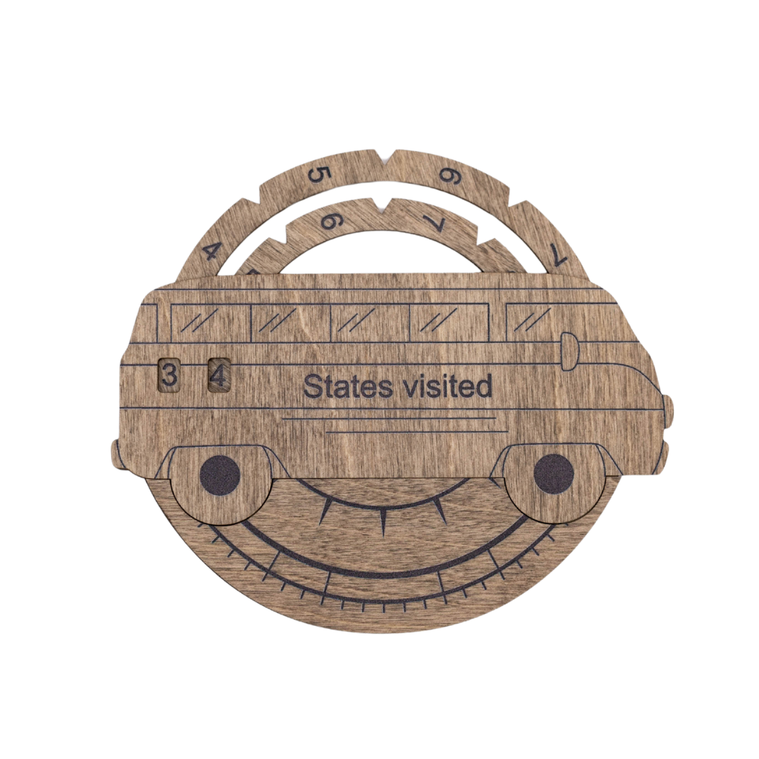 Wooden states-visited tracker board with numbered slots and smiling face graphic