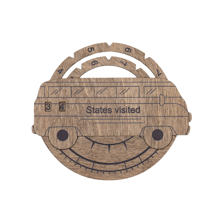 Wooden states-visited tracker board with numbered slots and smiling face graphic