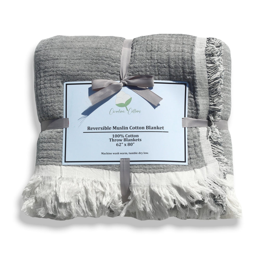 Grey and white reversible muslin throw blanket bundle tied with a bow