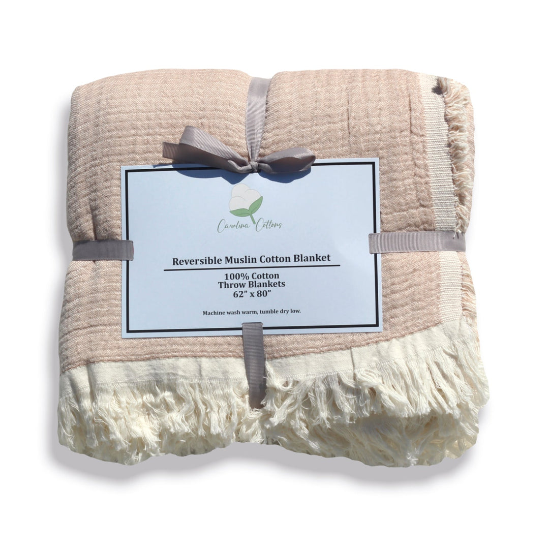 Ivory and grey reversible muslin throw blanket bundle tied with a bow