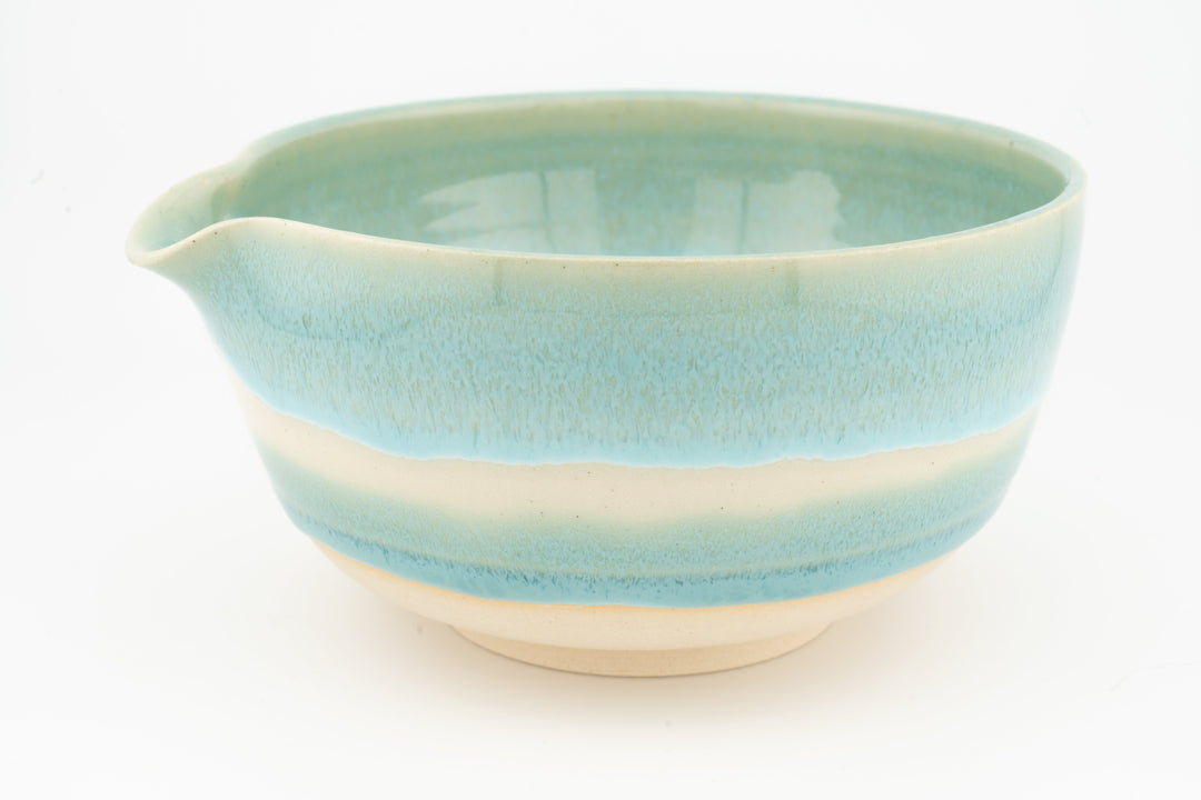 Ceramic bowl with optional spout, light teal/blue glaze, scalloped rim and spout