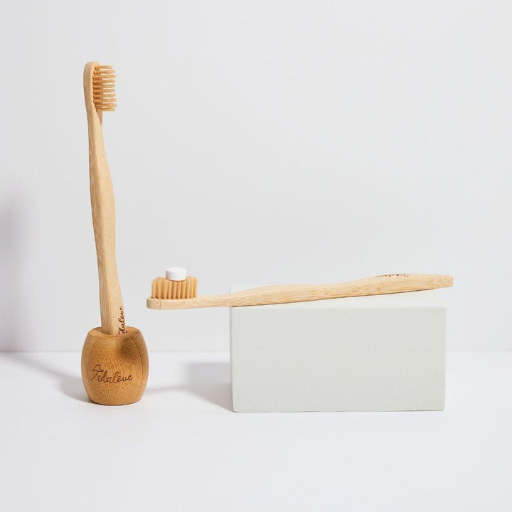 Bamboo toothbrush twin pack with two wooden handles and small bristle heads