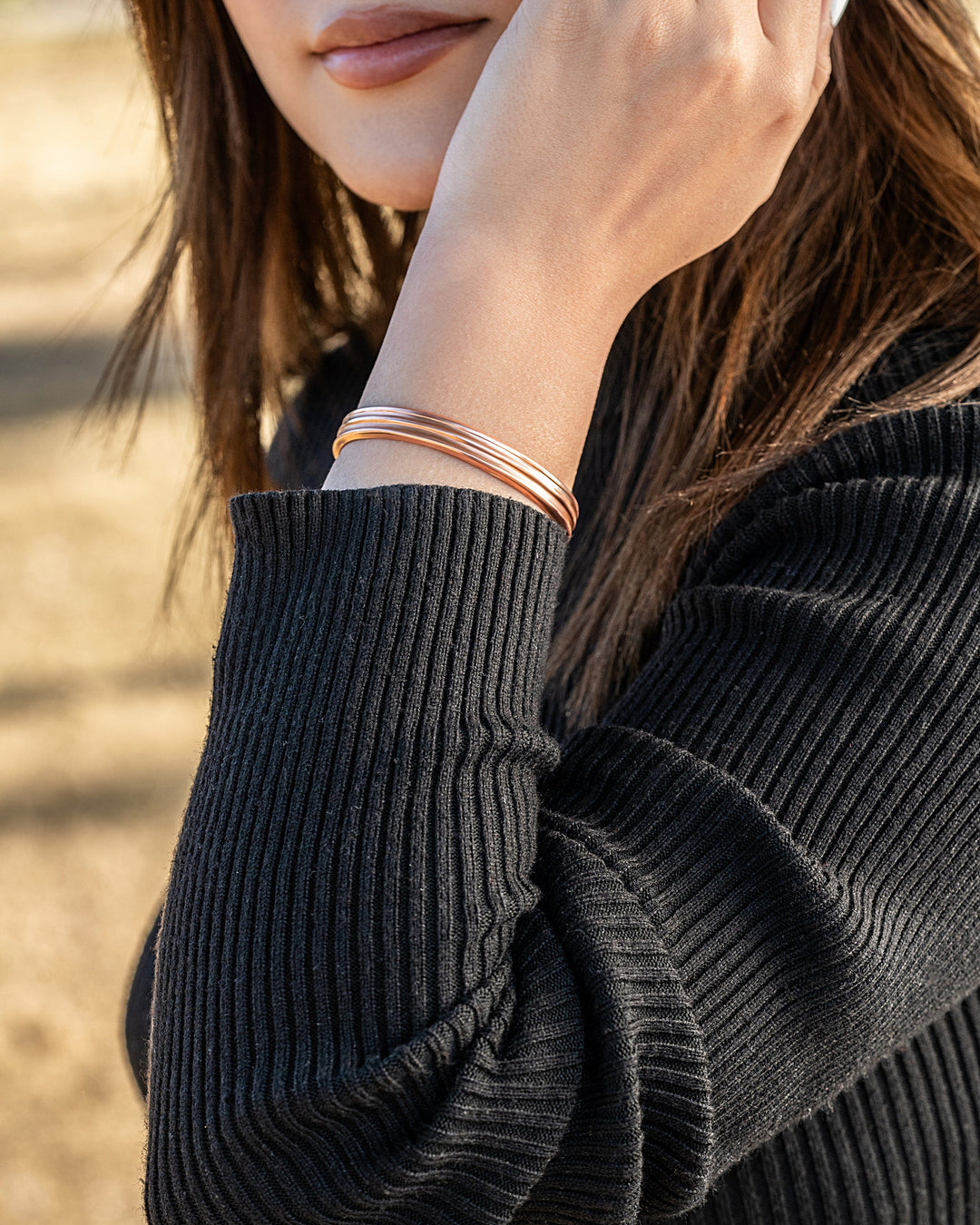 Copper cuff bracelet with three stacked tiers on wrist