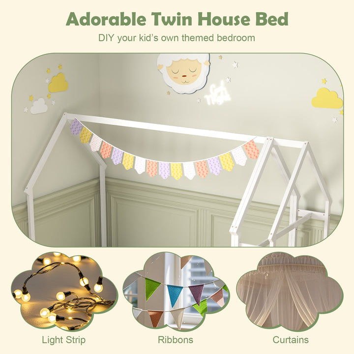 White twin house-style bed frame with roof canopy and colorful hanging bunting