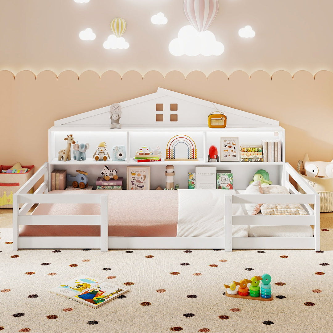 White twin floor bed with open storage compartments, low guard rails, and head shelf