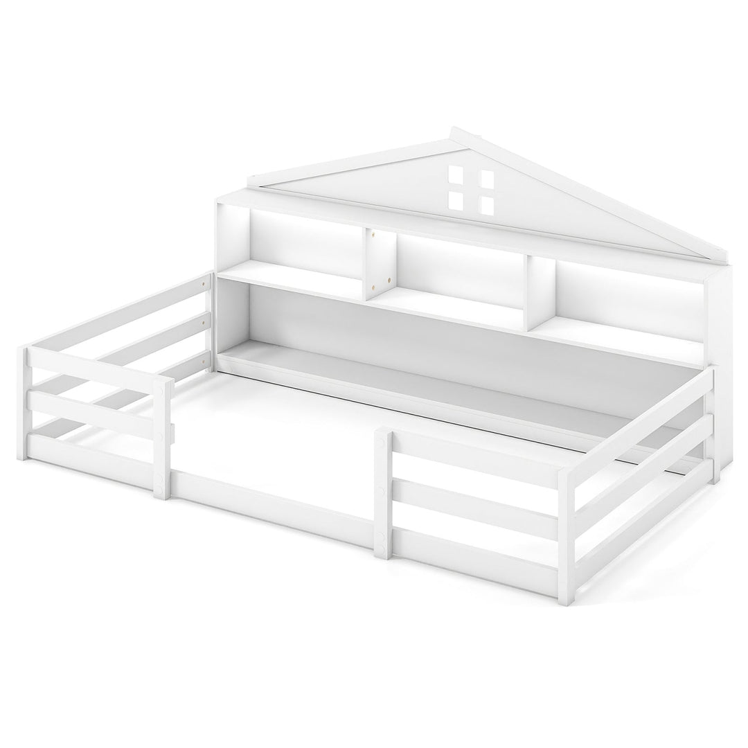 White twin floor bed with side rails, open storage shelves, and top ledge