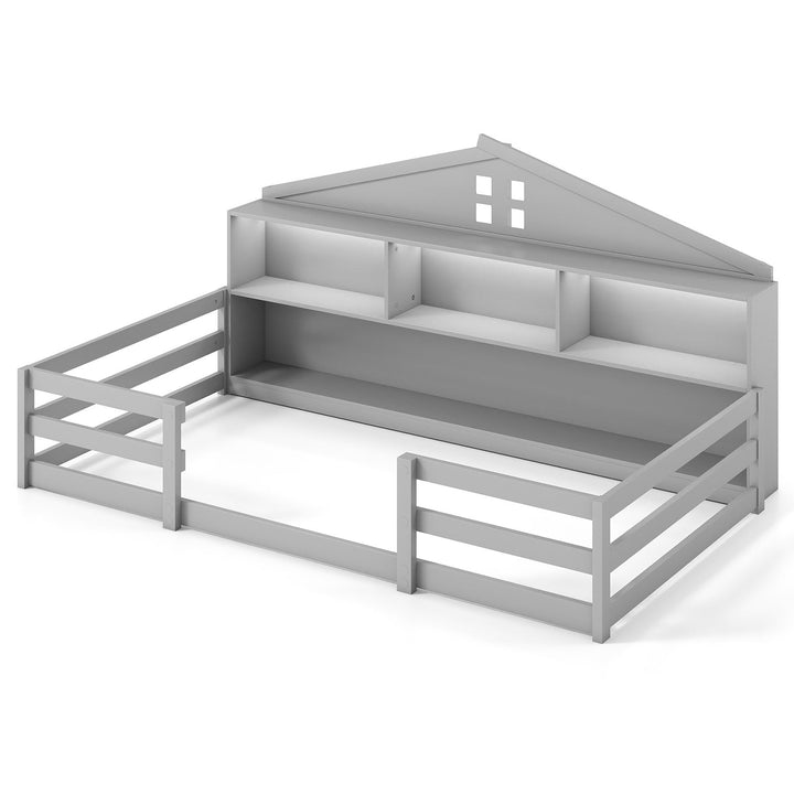 Gray twin floor bed with side rails, open storage shelves, and top ledge