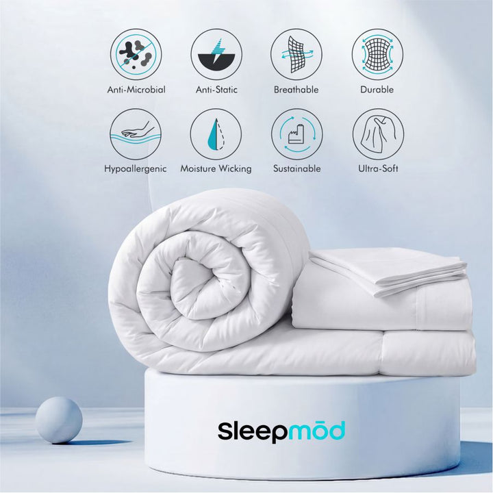 White rolled cooling comforter with two stacked folded layers