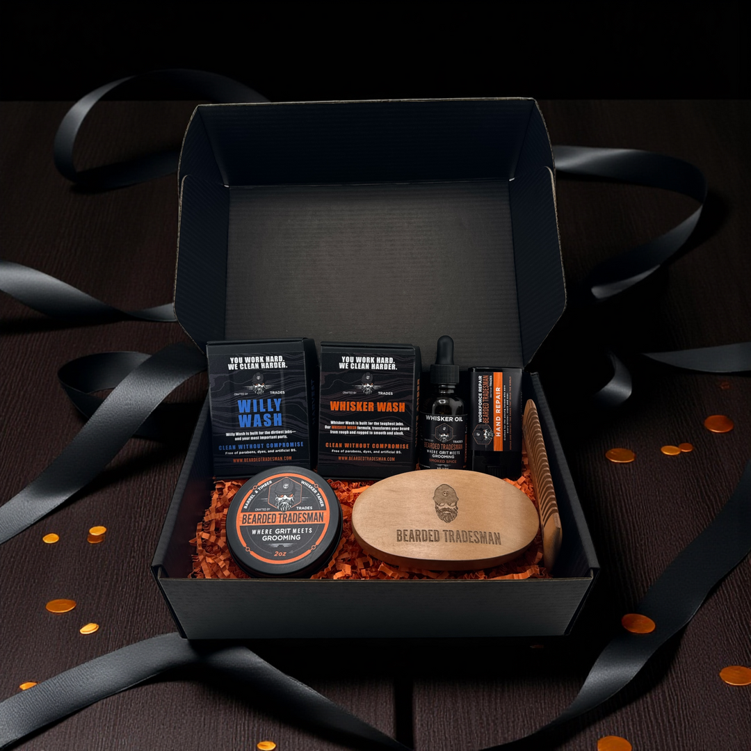 Grooming gift set in open box with beard balm tins and wash bottles