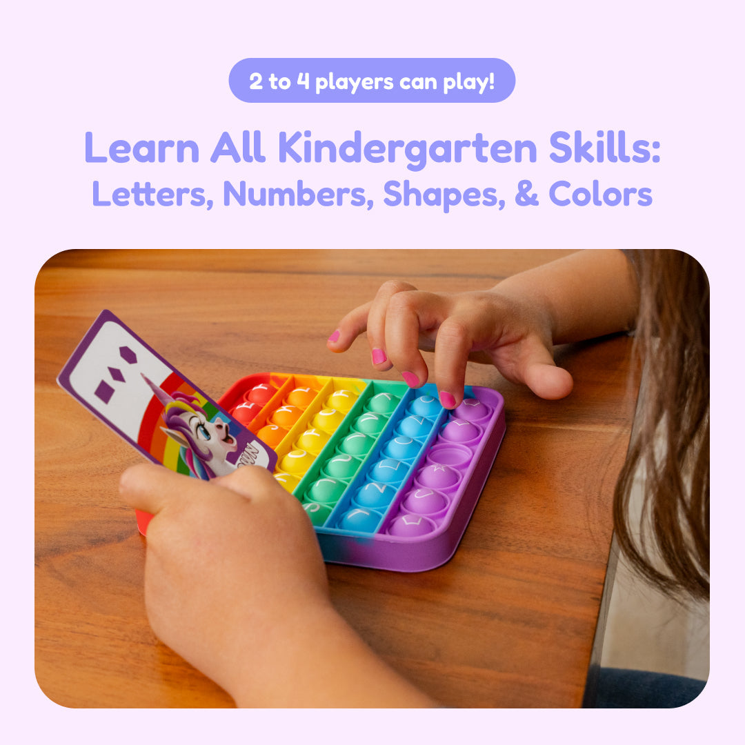 Unicorns and Dragons fidget game board with letter, number, shape, and color tiles
