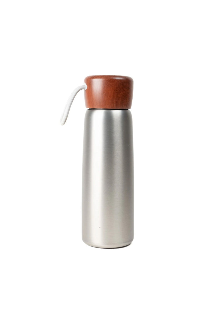 Stainless steel insulated tumbler with wooden lid and white carry loop