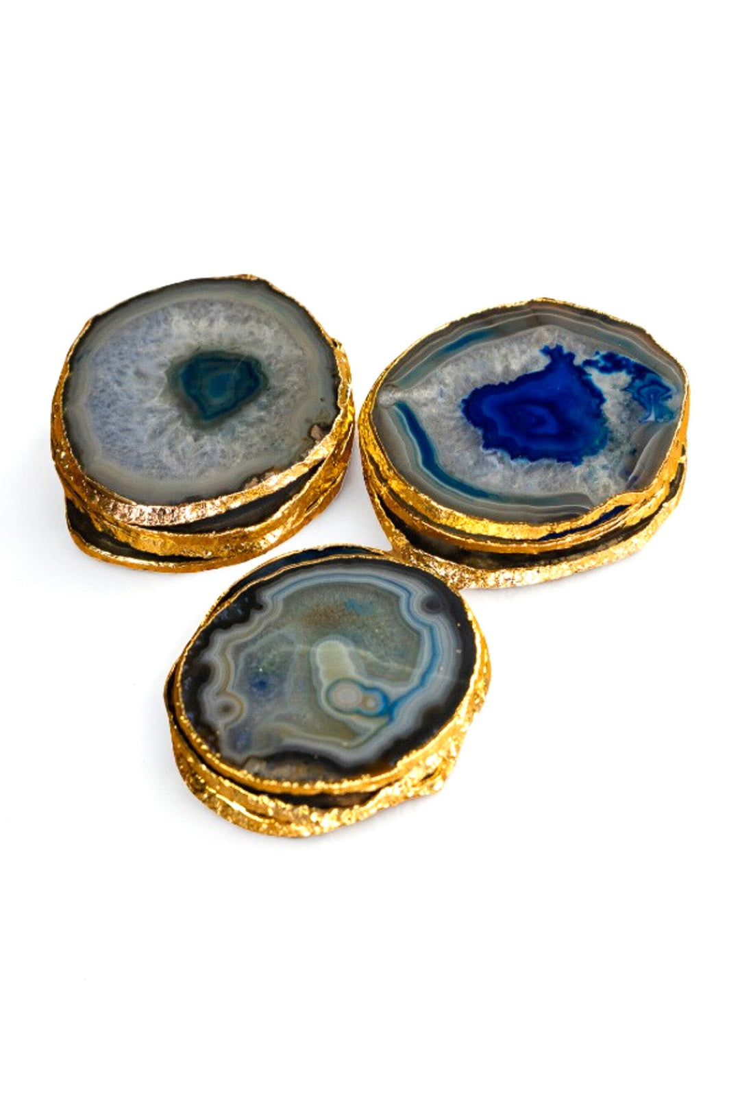 Round blue agate coasters with textured gold rim, showing blue and gray stone patterns