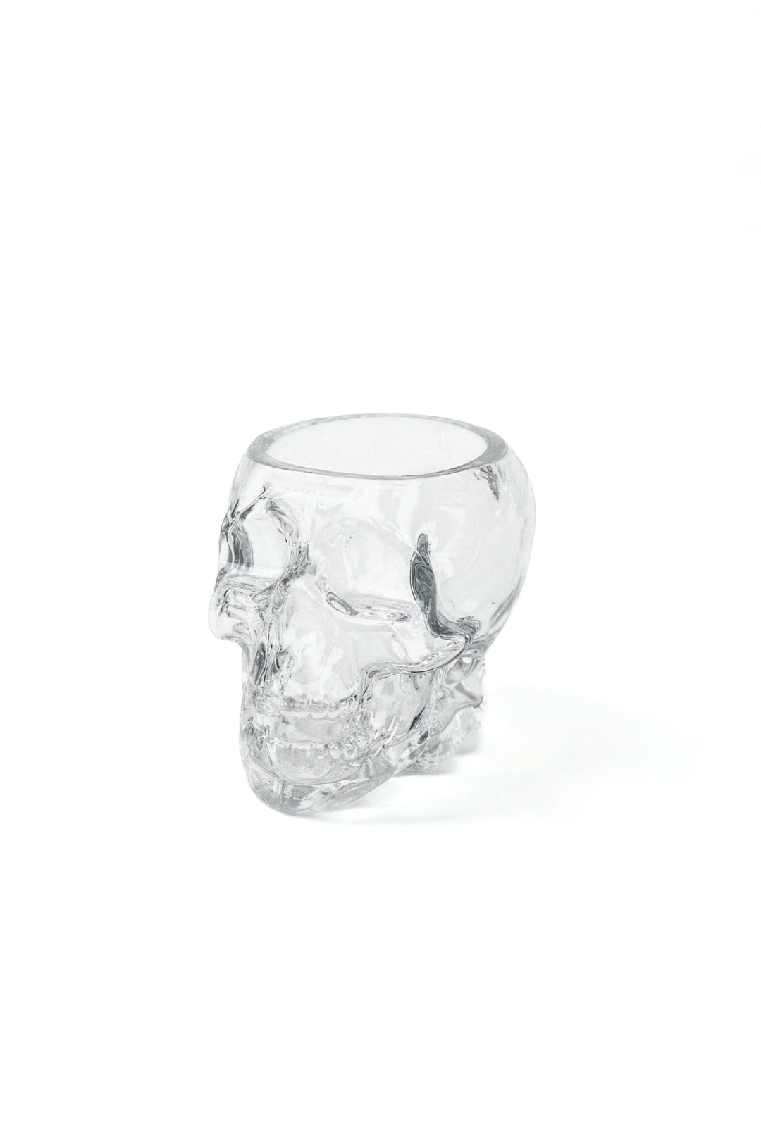 Skull-shaped whiskey glass with clear glass skull detail
