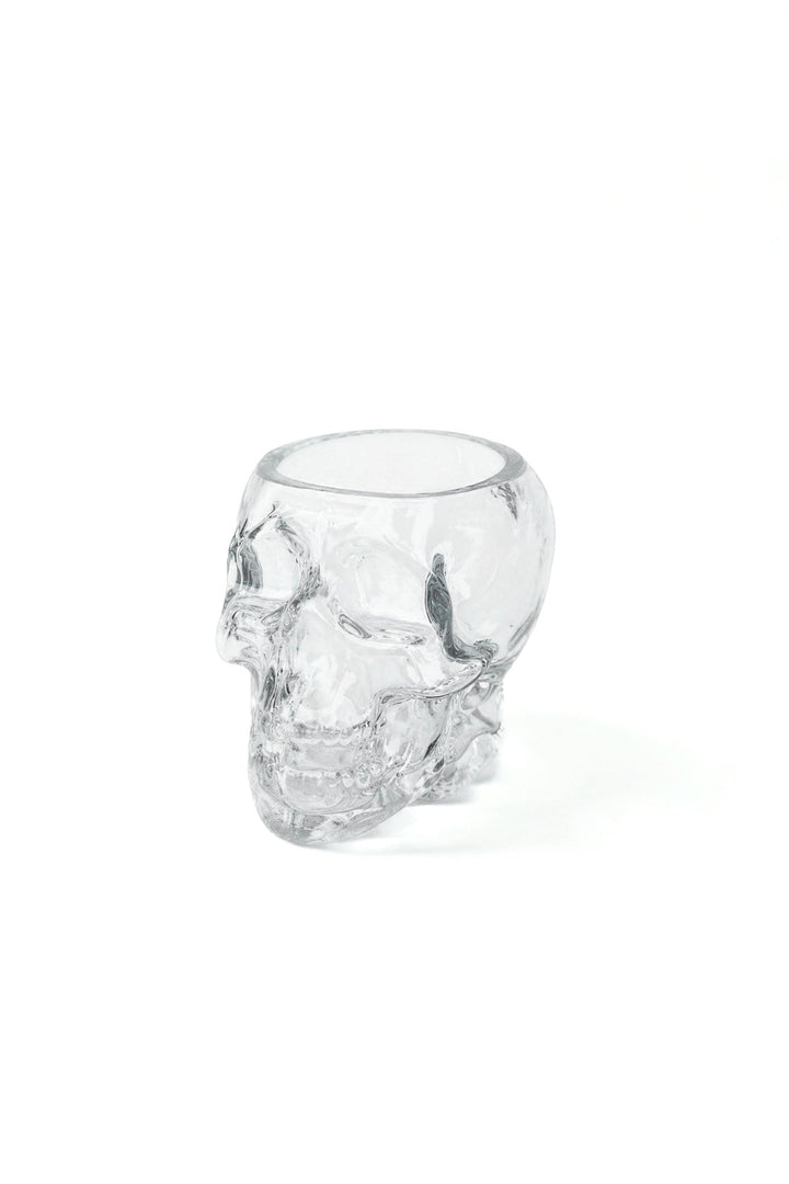 Skull-shaped whiskey glass with clear glass skull detail
