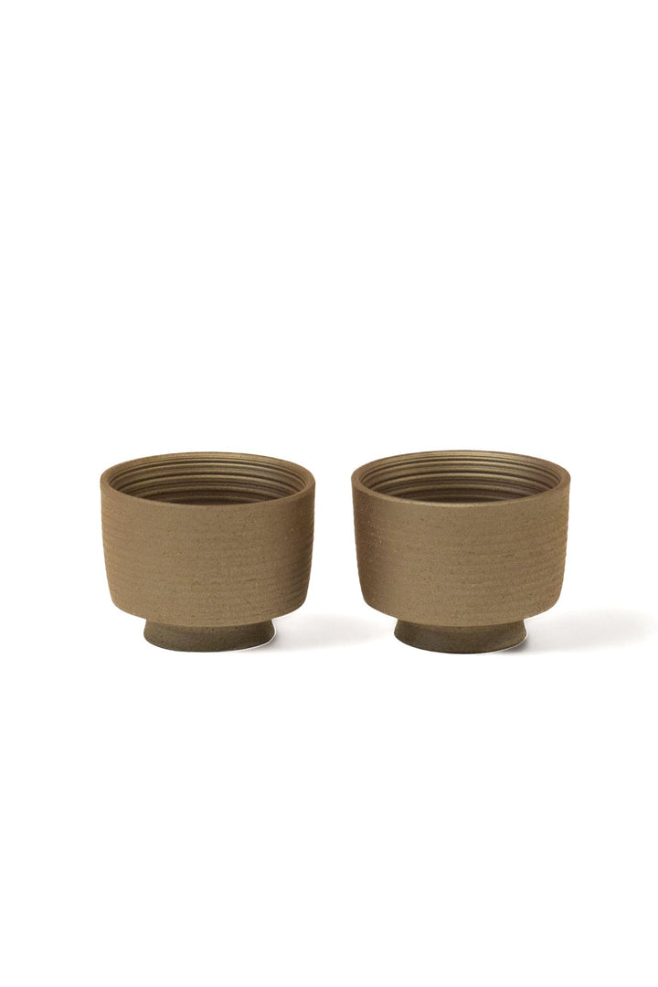 Small rough Arabic-style tea cup pair, dark beige textured ceramic, rounded rims