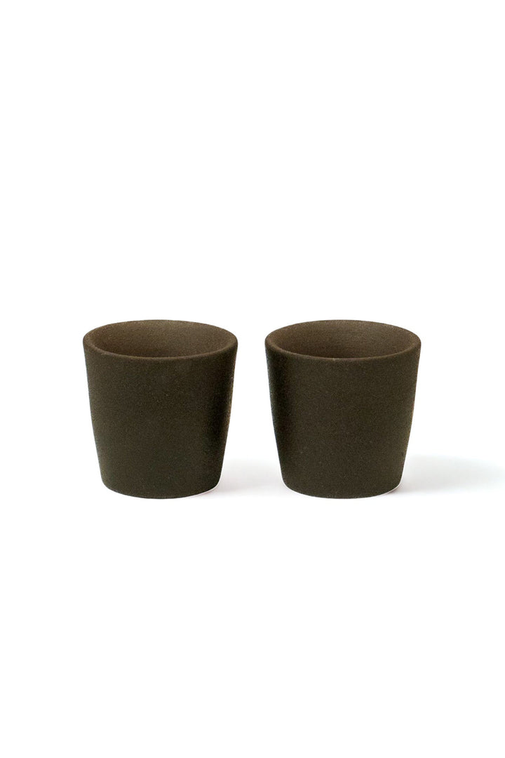 Set of 2 matte stoneware shot glasses with dark brown textured finish