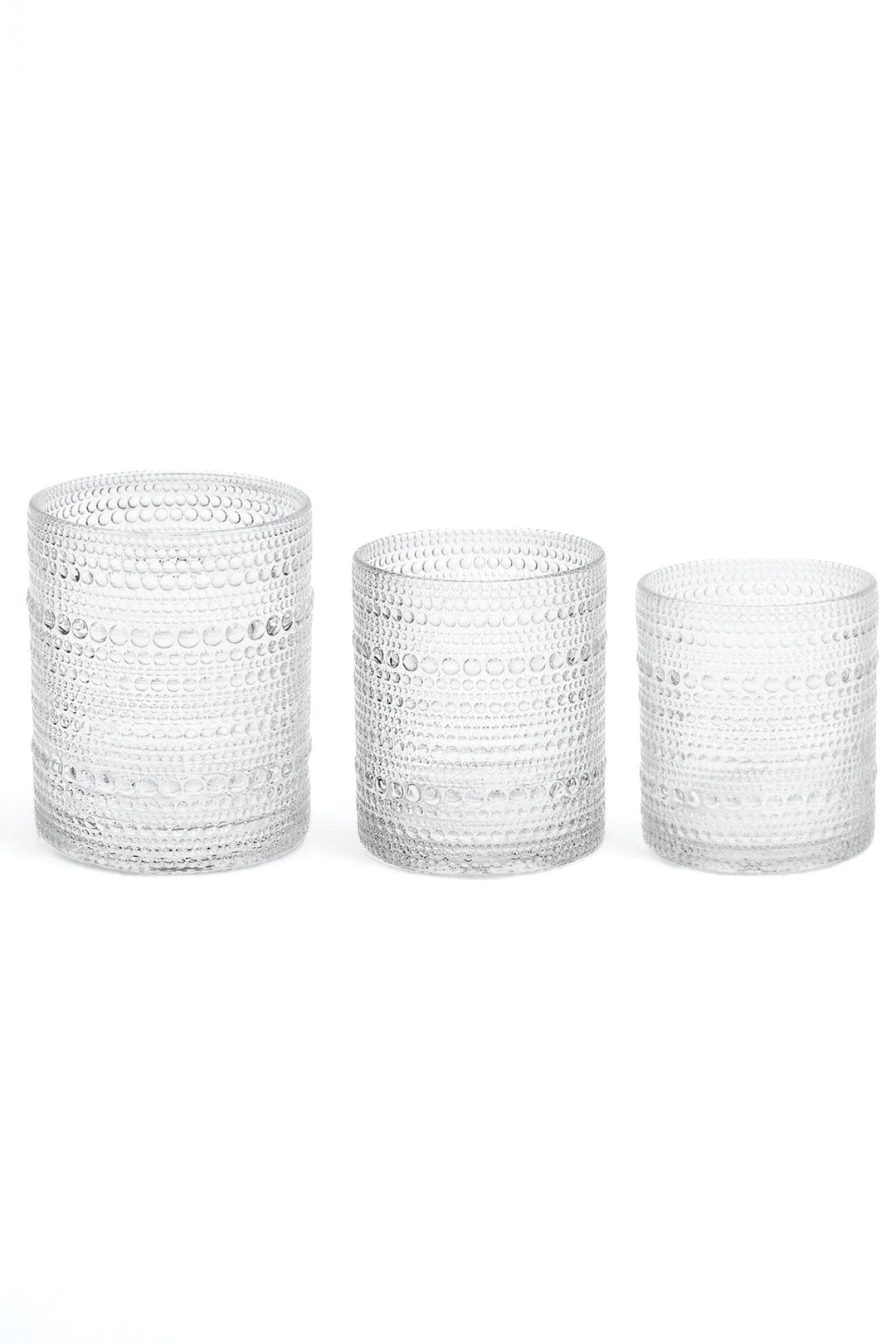 Bubbled glassware set of three clear cylinder cups with beaded texture, varying heights